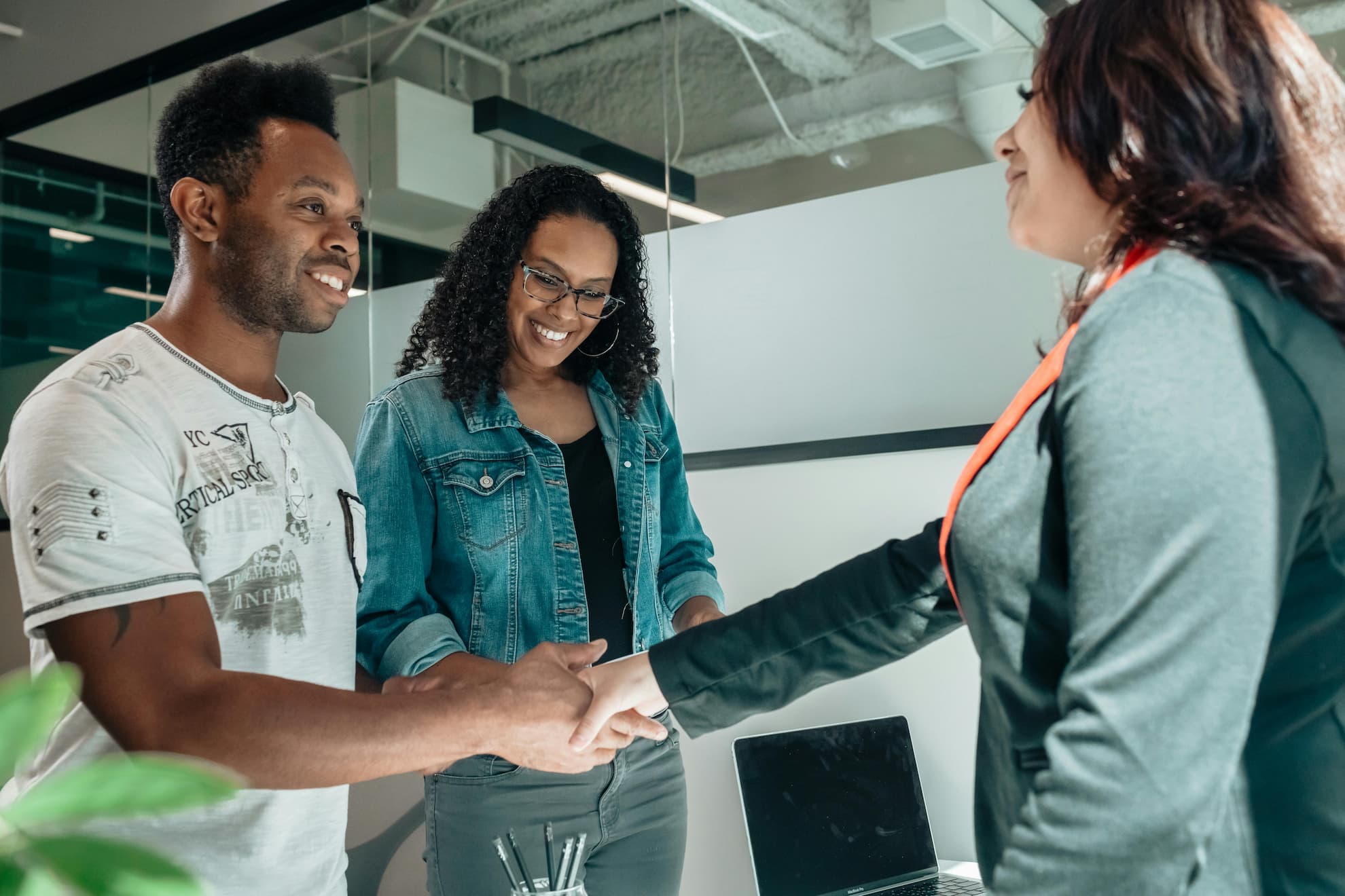 Couple meeting with a lending advisor.